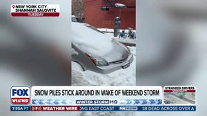U.S. Coast Guard engaged in icebreaking operation across frozen New York Harbor