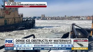 U.S. Coast Guard engaged in icebreaking operation across frozen New York Harbor