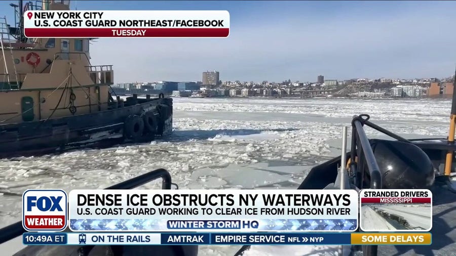 U.S. Coast Guard engaged in icebreaking operation across frozen New York Harbor