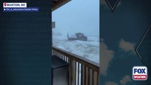 Watch: Collapsed house floats in ocean in Buxton during nor'easter