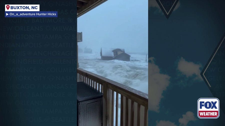 Watch: Collapsed house floats in ocean in Buxton during nor'easter