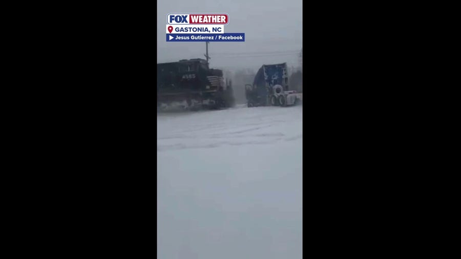 Must-see video captures collisions between stalled snow-ridden semi-truck crushed by oncoming train