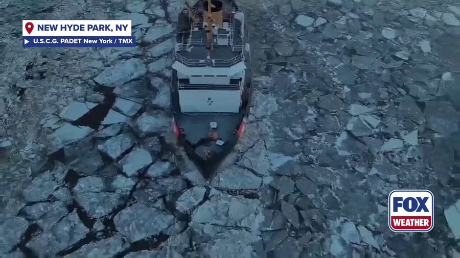 U.S. Coast Guard icebreakers plow through chunks of winter debris
