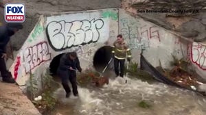 See it: Firefighters rescue dog stranded in drainage grate due to elevated water levels from rain in California