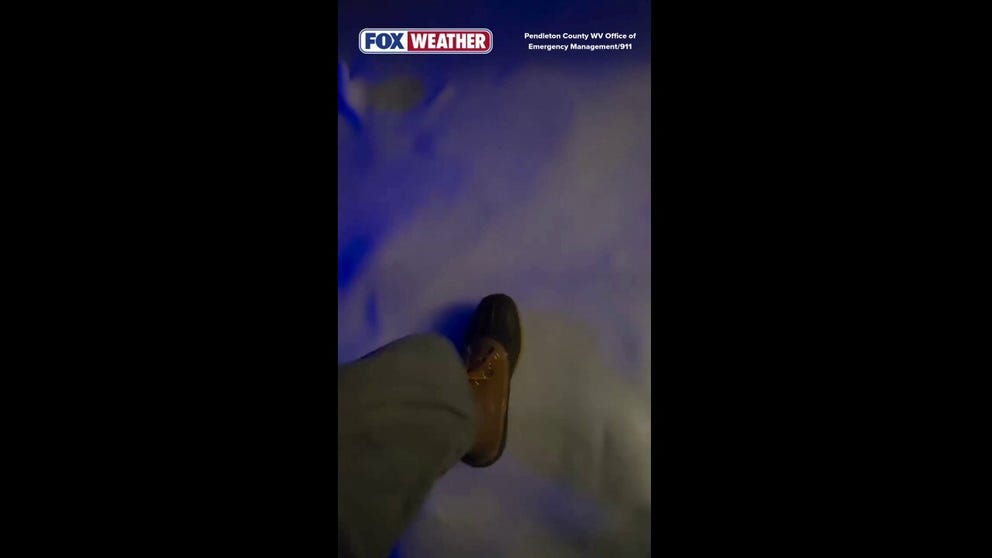 First responders from Pendleton County, West Virginia Office of Emergency Management, show off the slick and icy conditions at Shenandoah Mountain, where a solo female hiker slipped and injured herself awaiting rescue.