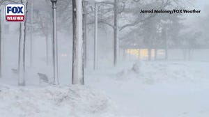 Historic blizzard blasts Boston with howling winds after storm 'bombs out' off coast