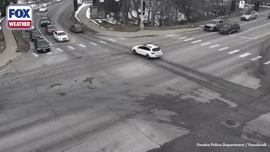 Sinkhole swallows two cars in Omaha, Nebraska