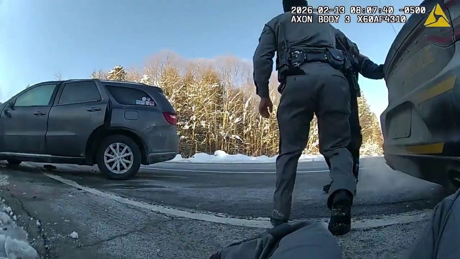 New York State trooper stuck by vehicle 