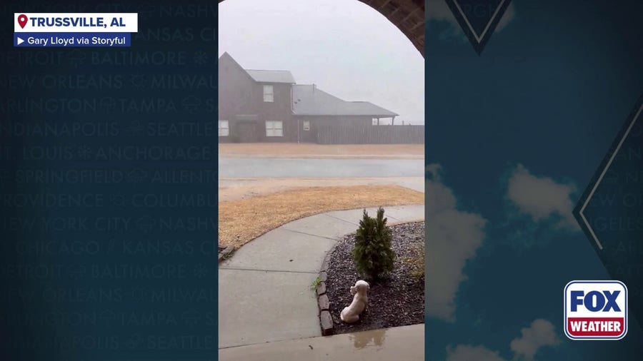 Thunder rumbles while heavy rain comes down on Alabama