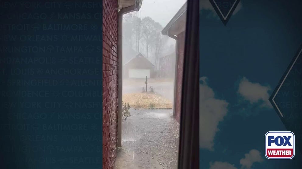 Heavy rain and hail came pouring down in Birmingham, Alabama on Thursday as severe weather moved through the area. There have been reports of a tornado and hail falling at 2 inches in diameter.