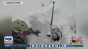 Two skiers rescue a man trapped in snow 