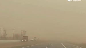 Dust Storm covers Texas highway in orange haze