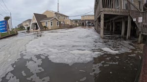 Storm surge floods hotel along Outer Banks as Hurricane Erin swirls offshore