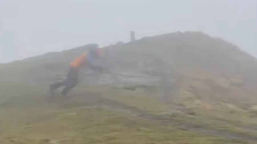 Man tries to walk in 115 mph winds