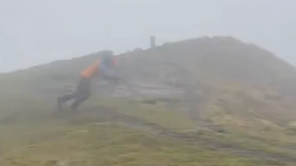 Thomas Soullet decided to try and walk during 115 mph peak winds while atop France's mile-high Puy de la Tache during Storm Benjamin.