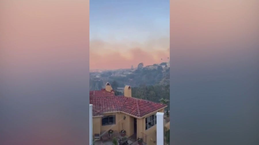 Emerald Fire has smoke cloud the sky above Laguna Beach