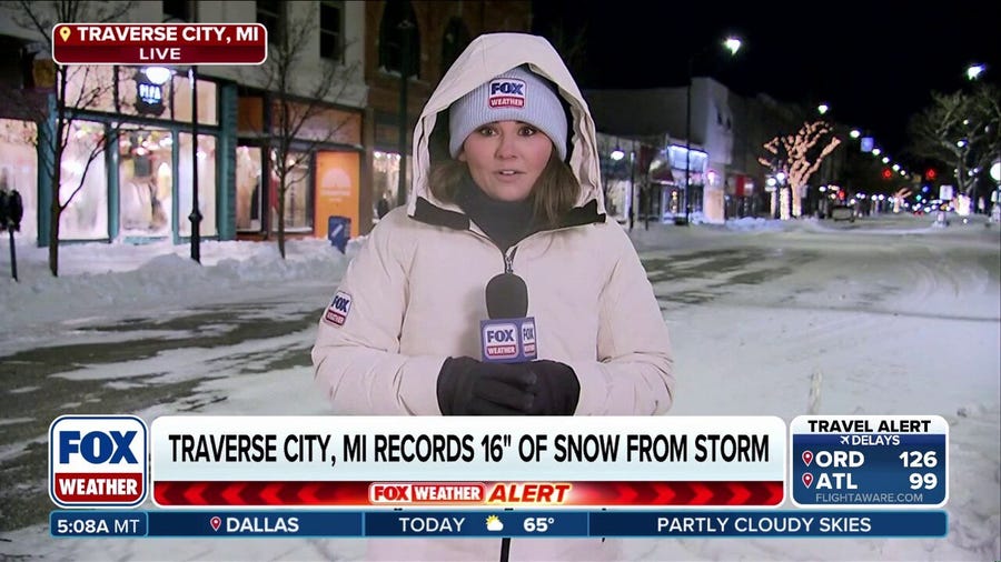 Snow squalls, dangerous travel continue after blizzard brings feet of snow to Michigan