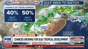 Tropical development odds increase as disturbance edges toward warm, open water