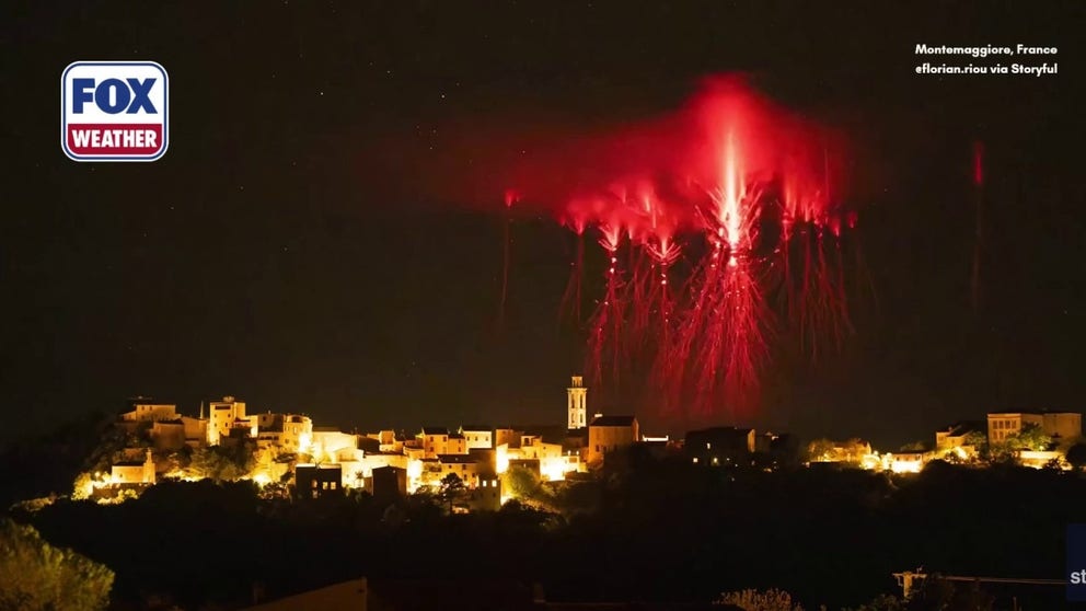 A weather photographer captured rare red sprites, powerful electrical discharges invisible to the naked eye,  flashing high above a French mountain village on Sept. 16. 