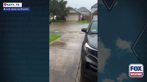 Watch: Cars create wakes in Katy, Texas, neighborhood as thunderstorms trigger flash flooding