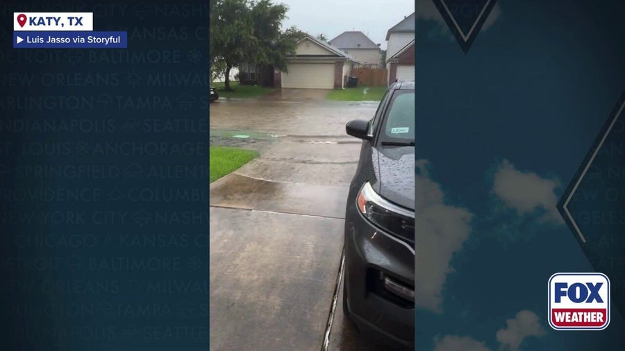 Watch: Cars create wakes in Katy, Texas, neighborhood as thunderstorms trigger flash flooding