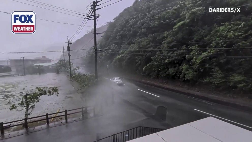Winds from Typhoon Dolphin howl through Amami, Japan, on August 6, 2026.