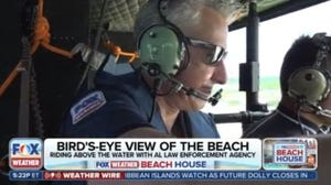 Riding high above the water with the Alabama Law Enforcement Agency in a helicopter