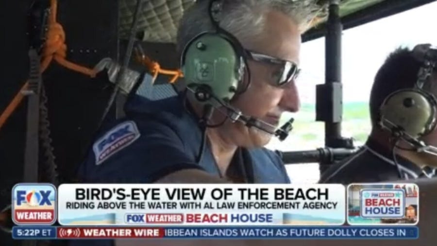 Riding high above the water with the Alabama Law Enforcement Agency in a helicopter