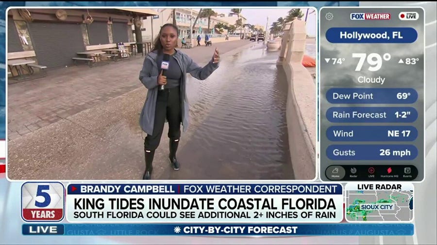 Rain and King Tides lash the Florida coast, creating a flood threat in the Southeast