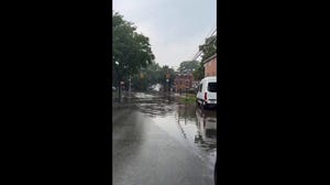 Queens street flooded after New York City lashed by heavy rain
