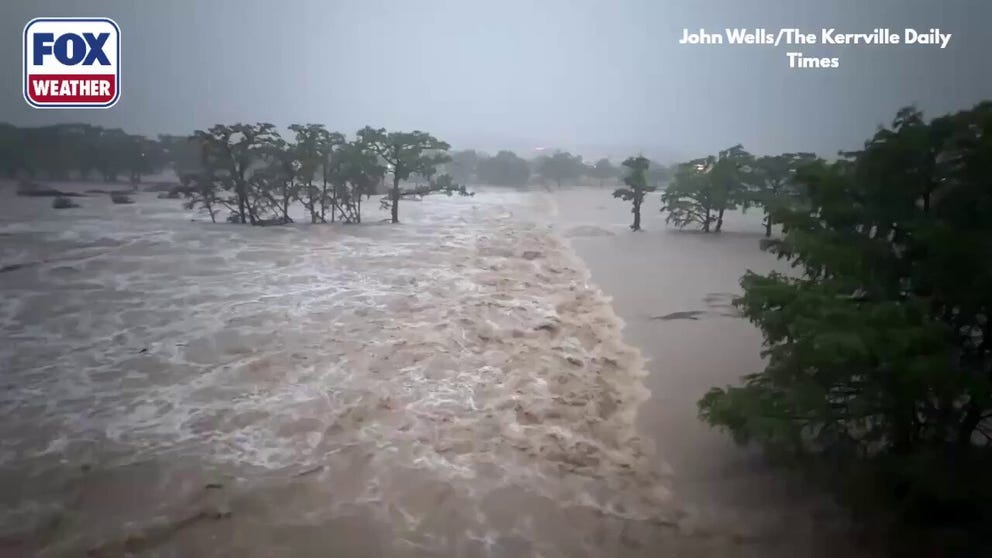The Guadalupe River rose to incredible heights on Thursday morning, as a Flash Flood Emergency was in effect and the National Weather Service warned of a deadly flood wave. Video shows the swollen river furiously rushing through trees in Kerrville.