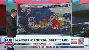 Moke continues to weaken while a tropical traffic jam persists in the Pacific