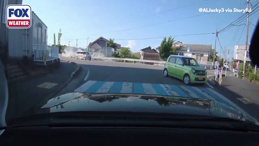 Dashcam video shows moment magnitude 6.8 sloshes water out of Japan canal