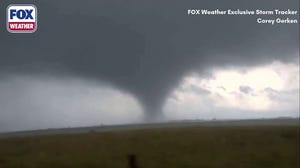 A tornado rips across Kansas as severe weather targets the Central Plains