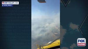 Watch: Firefighters take to the sky to save homes from Sandy Fire in Southern California
