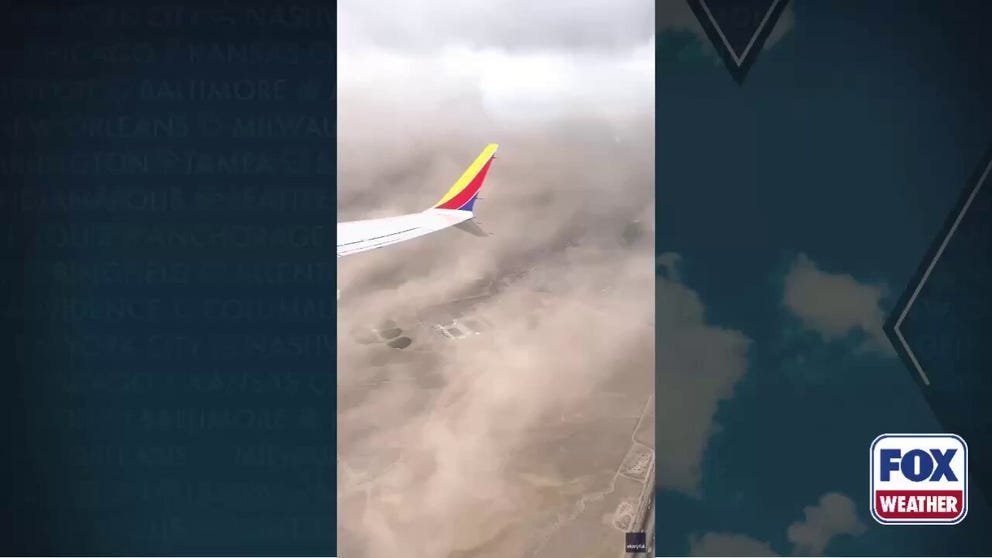While on a flight heading out of Albuquerque on Monday, a passenger captured incredible video of dust sweeping through the city.