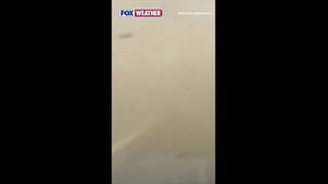 Blizzard-like dust storm reduces visibility on North Dakota highway