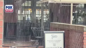 Boston drenched by heavy rain ahead of major temperature drop
