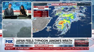 Tropical Storm Jangmi charges toward Japan with lashing winds, heavy rain