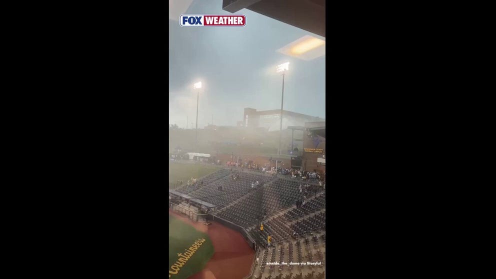 Powerful storms tore through a West Virginia University baseball game before one of the biggest games of the year, sending tents flying and fans scrambling for cover as dangerous winds swept through the area. The game was delayed but eventually resumed and finished under clear skies.