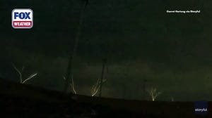 Upward lightning paints northern Oregon night sky