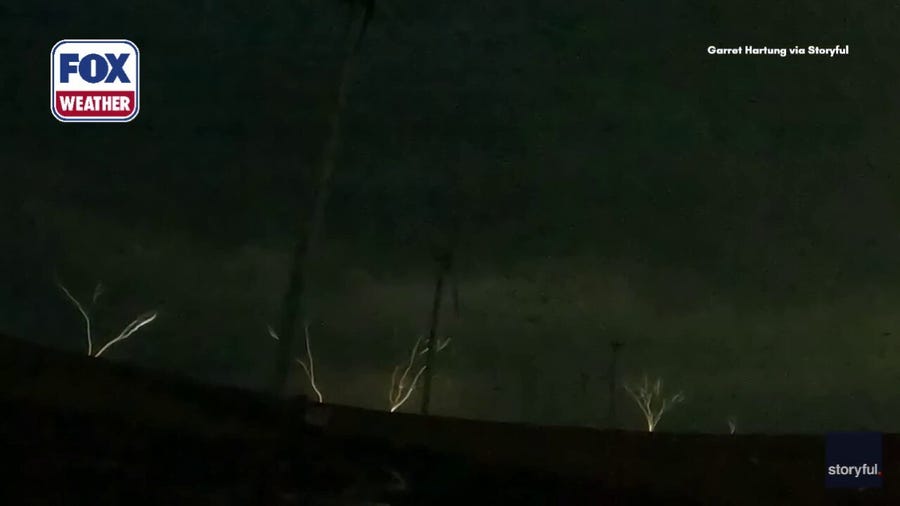 Upward lightning paints northern Oregon night sky