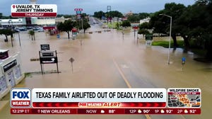 Texas family airlifted to safety after being forced from their home amid rising floodwaters