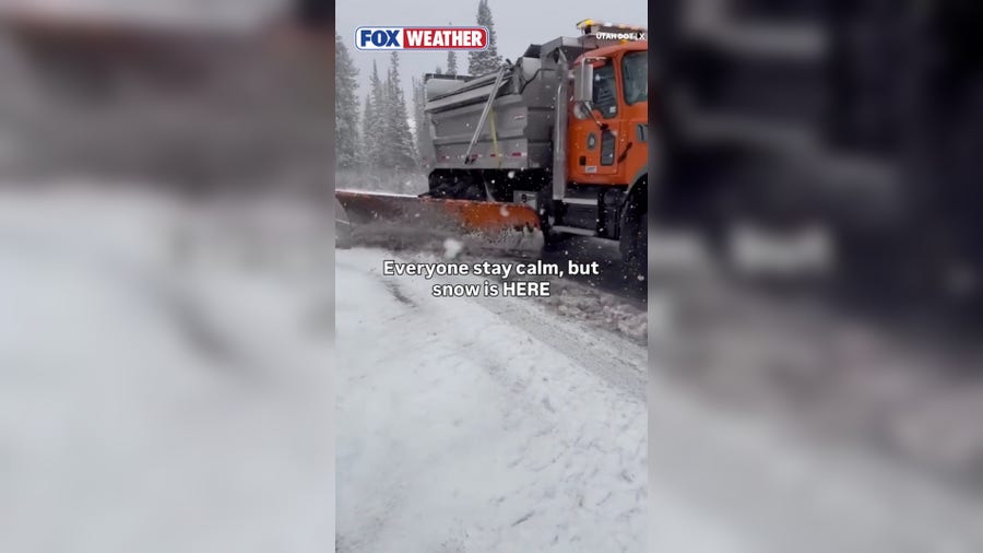 Snowplow clears roads during October snowstorm in Utah