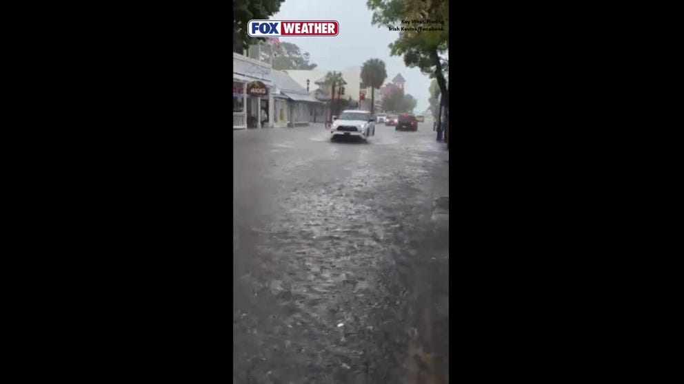 Duval Street in Key West turned into a river Thursday, Oct. 2026, as torrential downpours soaked South Florida. Key West broke a daily rain record that had stood since 1943.