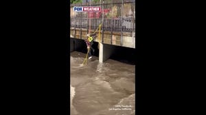 Three rescued from raging LA floodwaters