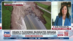 Deadly flooding leaves Indiana communities submerged in water
