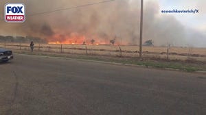 Watch: Wildfire rages in Texas' panhandle amid strong winds