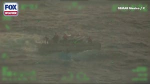 Watch: 2 fishermen rescued after being trapped floating in cooler for several days