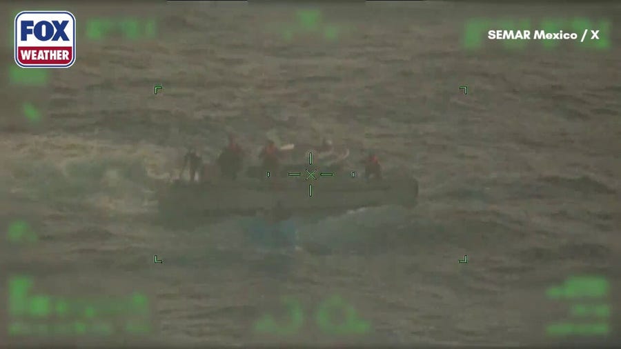 Watch: 2 fishermen rescued after being trapped floating in cooler for several days